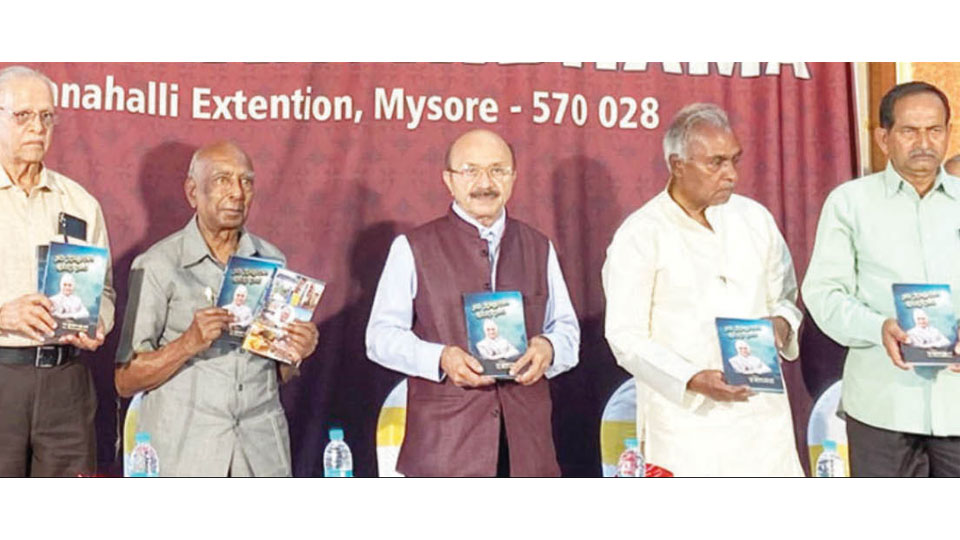 Book released at 30th anniversary of Vasavi Shantidhama