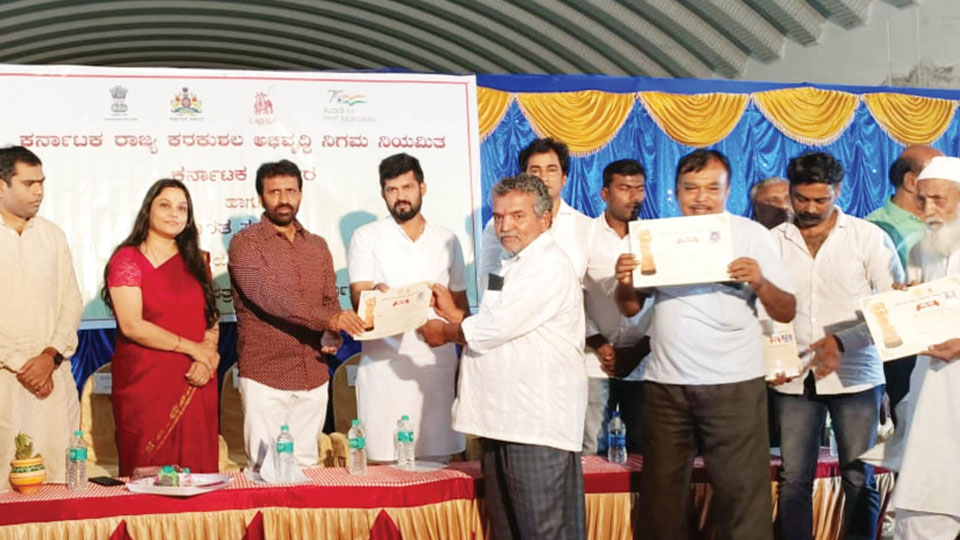 Title deeds distributed to 96 handicrafts artisans in first phase
