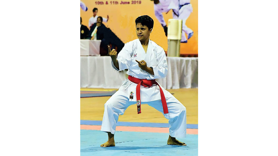 Wins gold medal at State Karate Championship