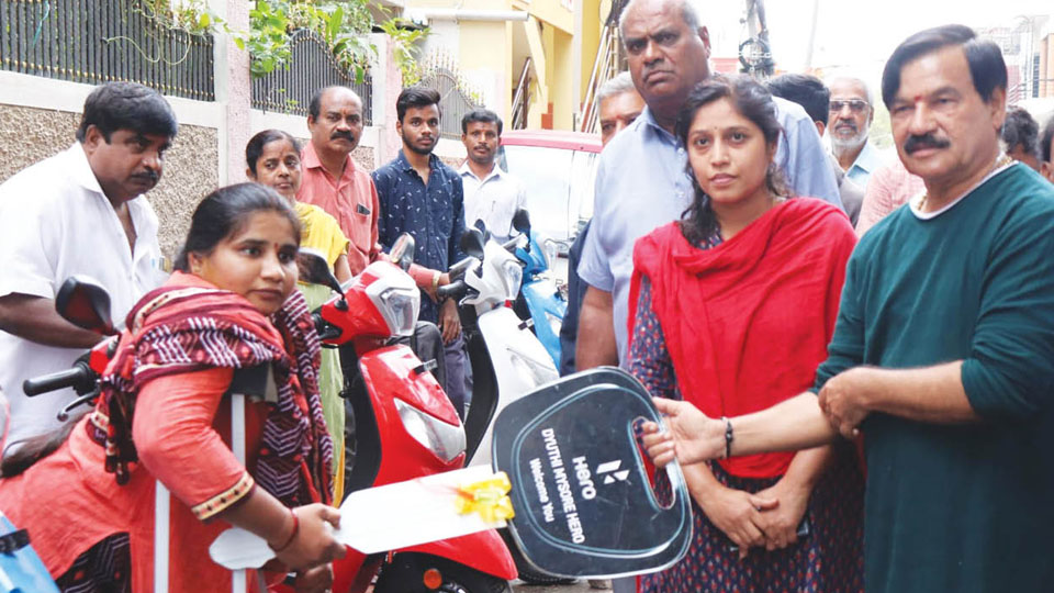 MLA distributes Tricycles to differently-abled beneficiaries
