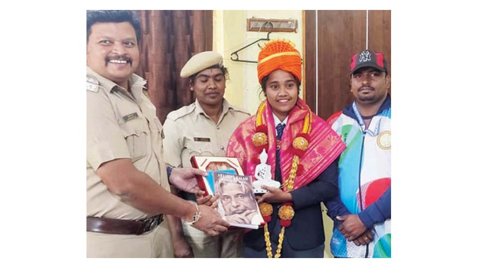 Narasimharaja Police felicitate Karate champion Sowjanya