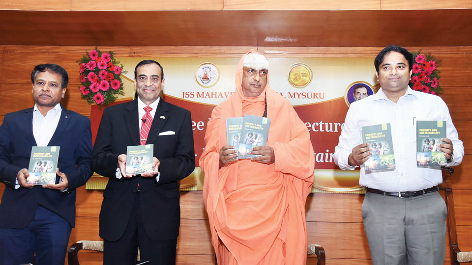 Mysuru DC releases book ‘Poverty and Sustainability’ at JSS