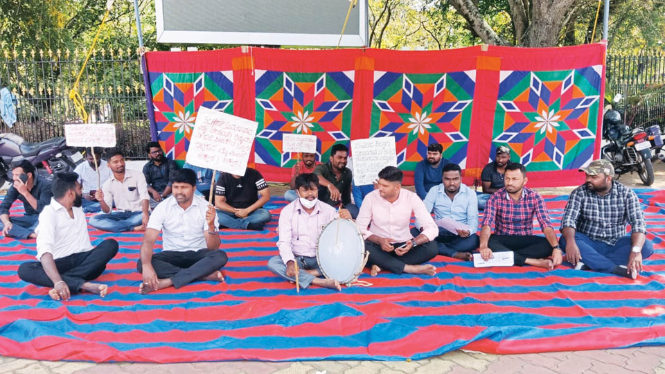 Mysore University Research Scholars stage stir for stipend