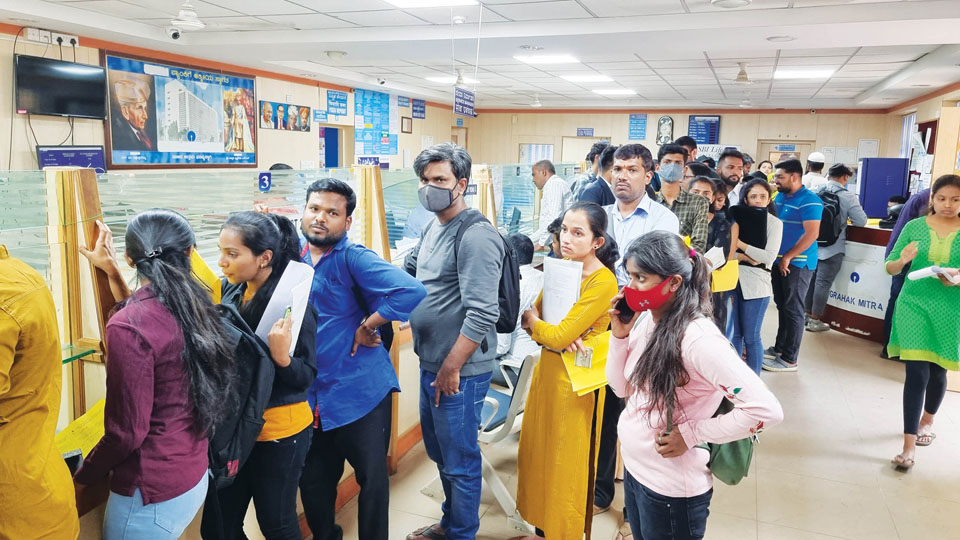 Student rush to pay exam fees at Bank near Crawford Hall