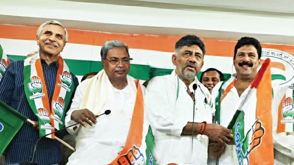 Basavegowda, Abdulla join Congress