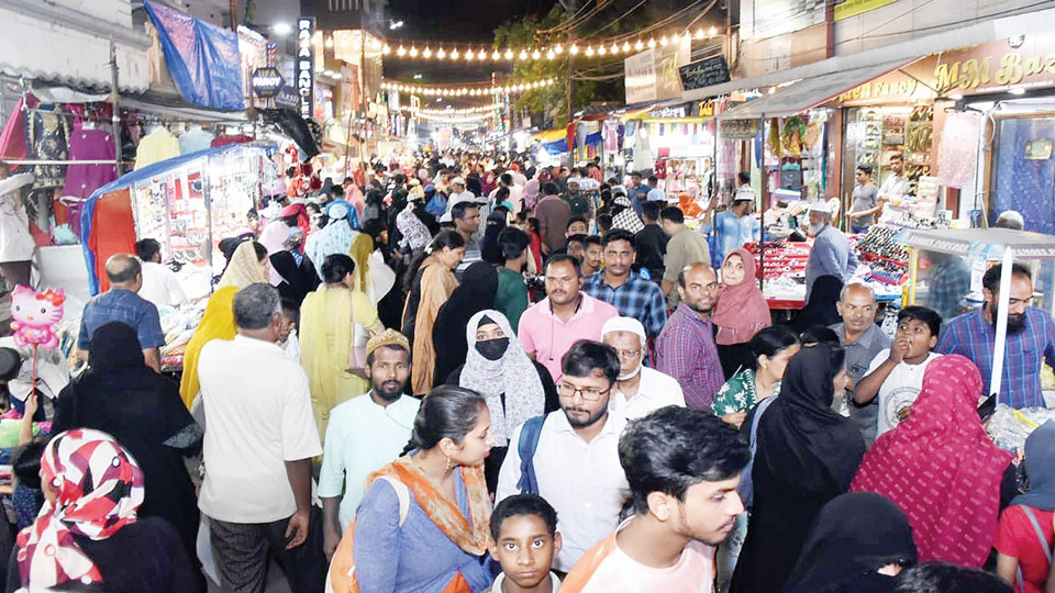 Street lights blaze as Ramzan food courts, shops are crowded