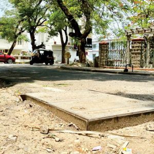 Protruding metal chambers posing threat to motorists, pedestrians