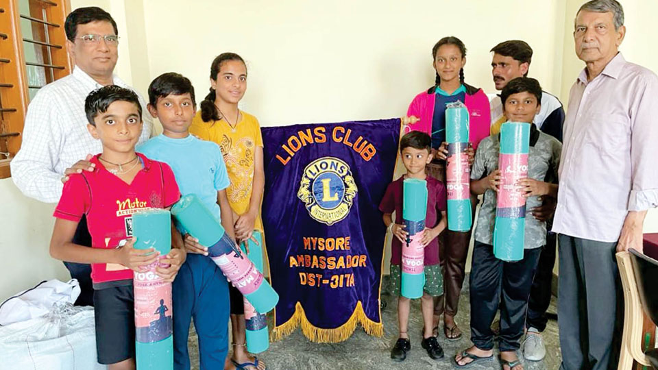 Lions Club Mysore Ambassador distributes yoga mats