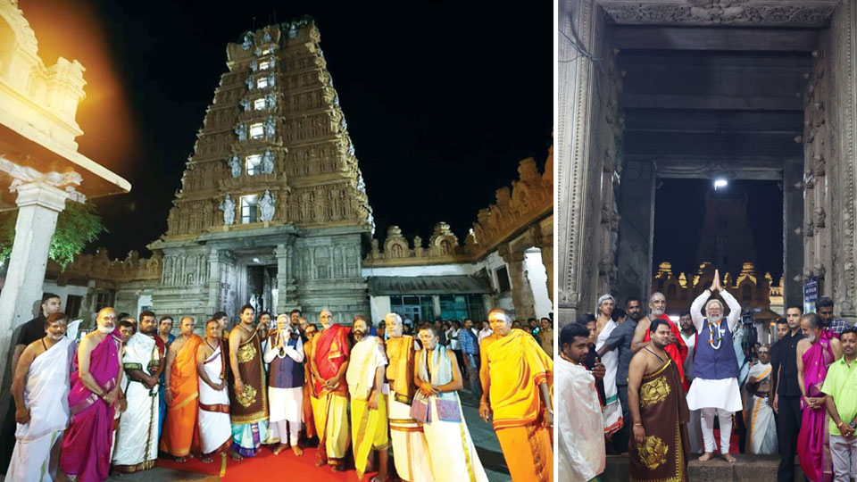 Modi prays at Srikanteshwara Swamy Temple, poses with priests