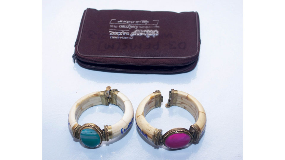 Gem-studded ivory bracelets seized