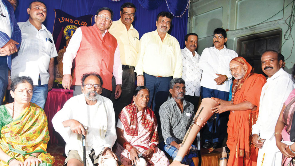 Lions Club distributes artificial limbs to physically challenged