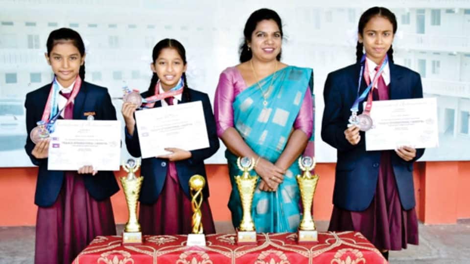 Prize winners in TRAACS International Carnival Yoga Sports Competition