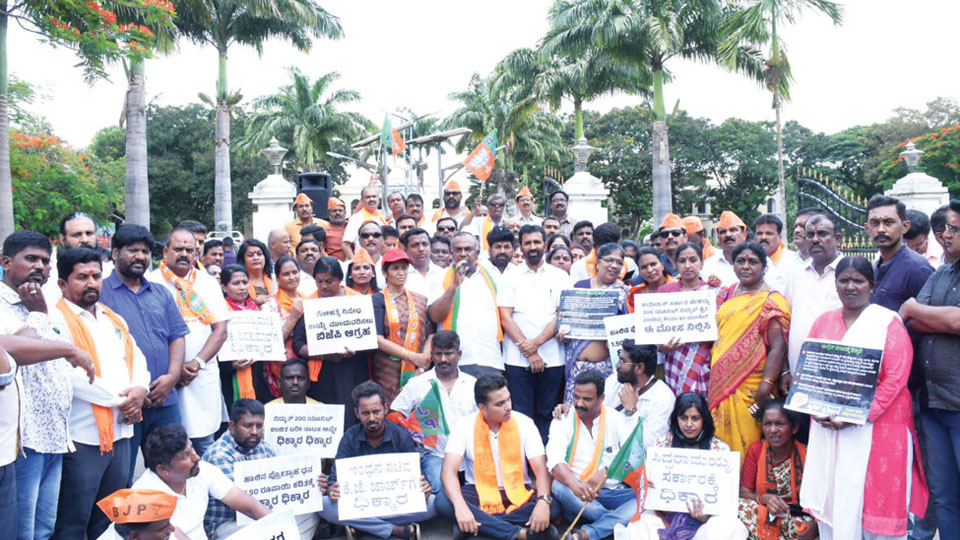 BJP stages protest against move to withdraw Anti-Cow Slaughter Act, hike in power tariff
