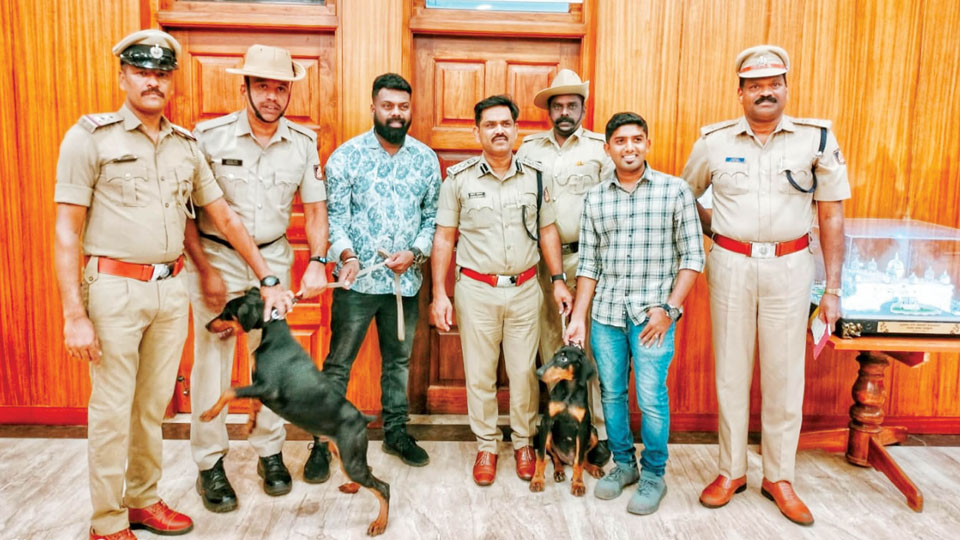 Two Doberman pups gifted to City Police Dog Squad