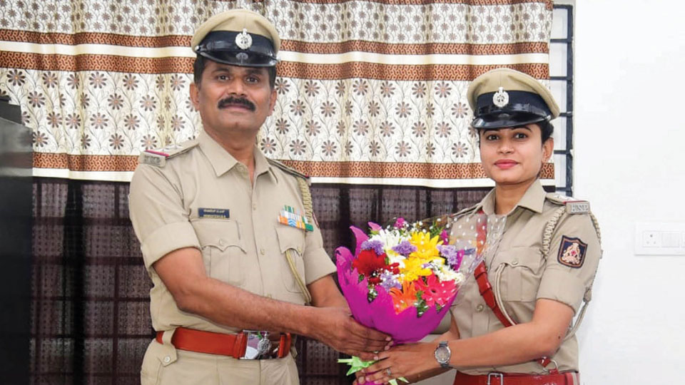 Rare moment as Sub-Inspector dad passes baton to daughter
