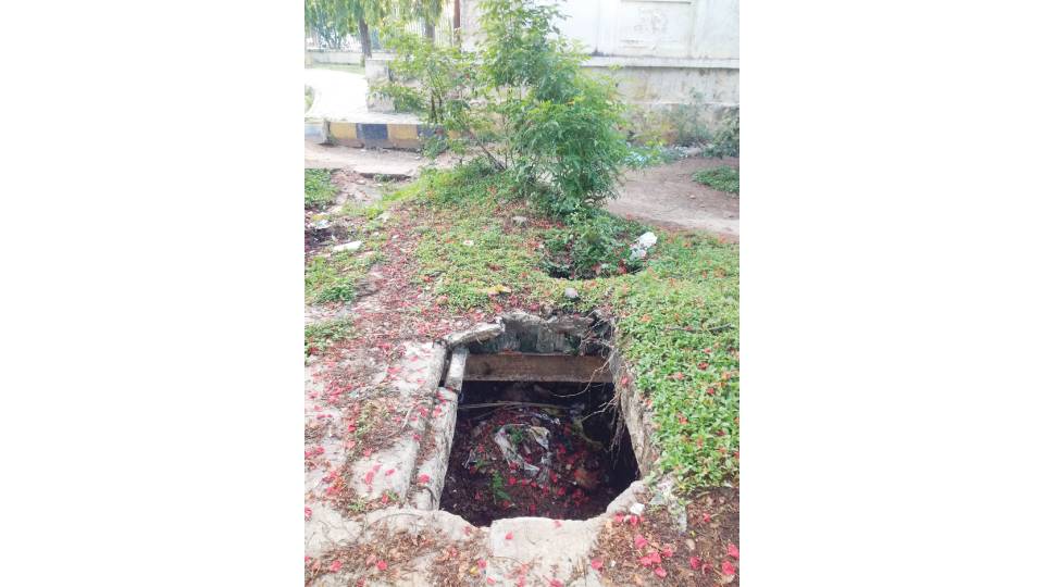 Cover this open drain on Lalitha Mahal Road