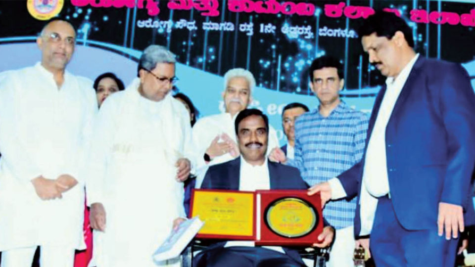 CM presents Best DHO State Award to Mysuru DHO Dr. K.H. Prasad