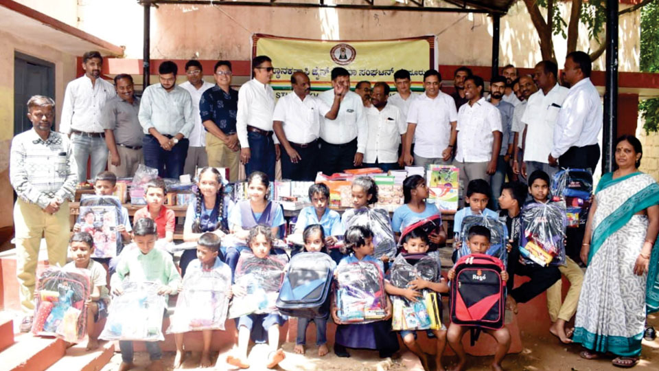 Study materials distributed to students of adopted Govt. School