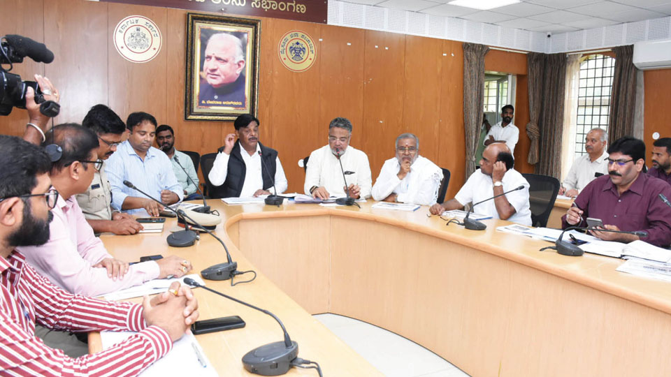 Minister chairs meeting of officers