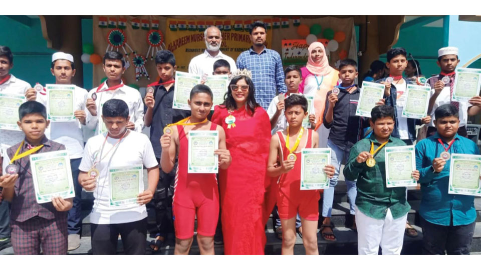 District-level wrestling contest winners