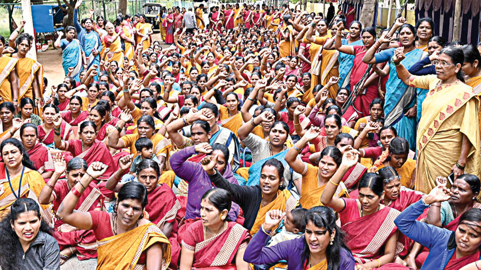 Hundreds of Anganwadi workers stage protest, seek implementation of their demands