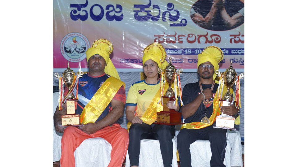 Arm wrestlers win titles in Dasara tournament