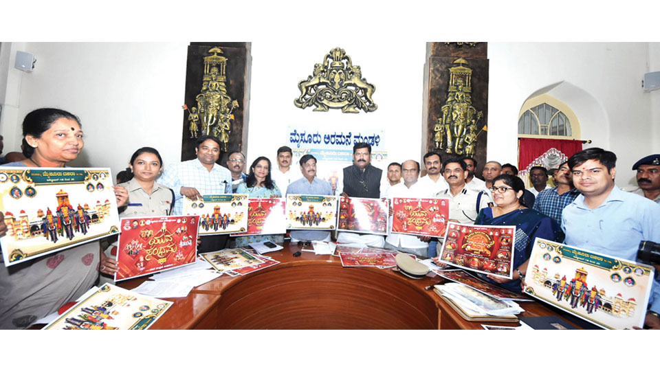 District Minister launches Dasara posters, website