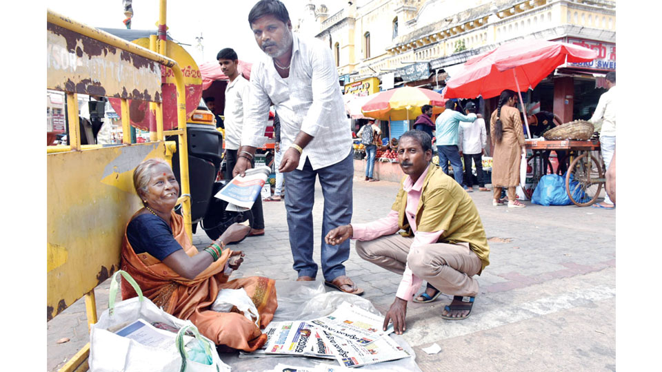 This constant newspaper vendor defies stereotypes