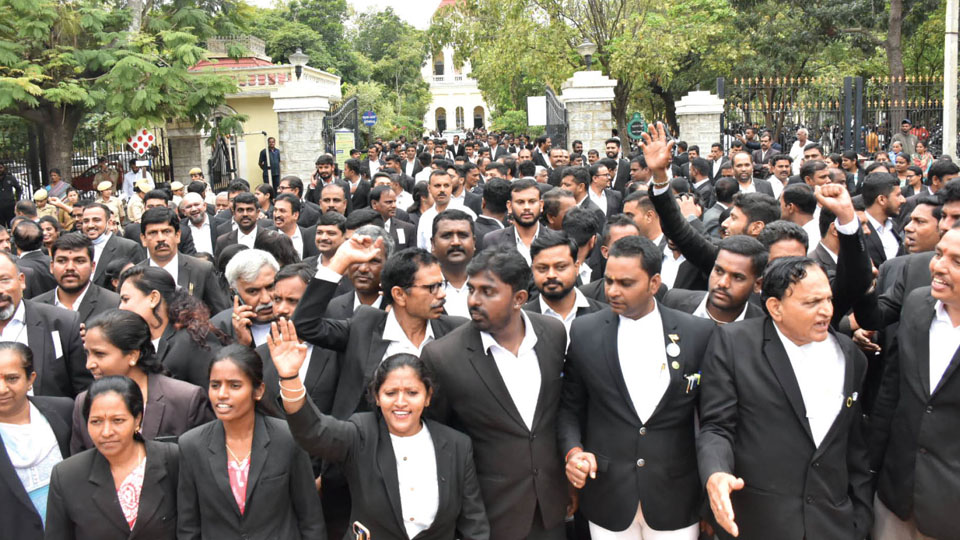 Police assault on Chikkamagalur Lawyer: City advocates take out protest rally