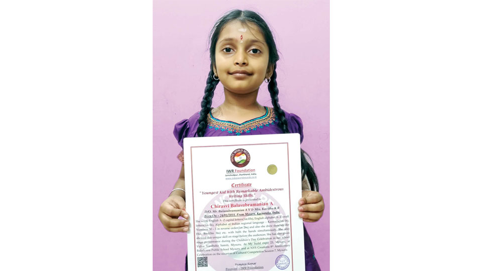 Enters India’s World Records for ambidextrous writing skills