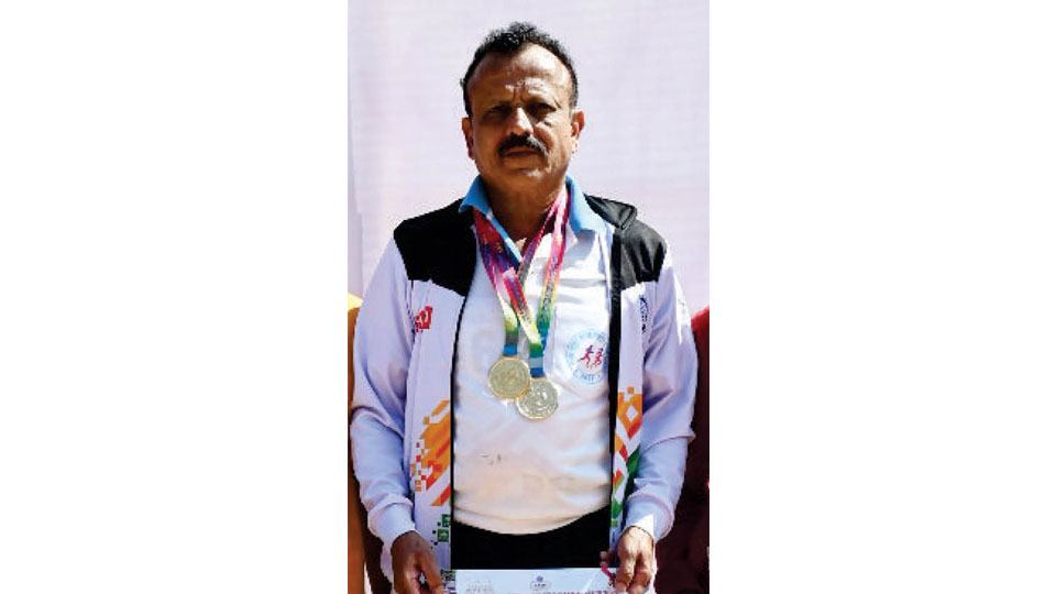 Wins two gold medals at State Masters Athletics Meet