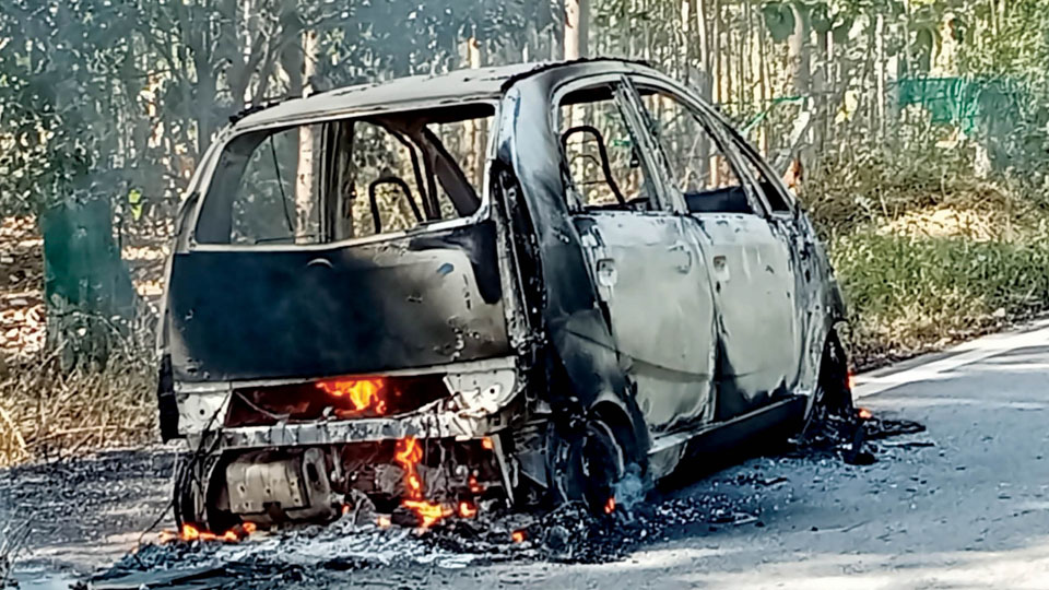 Roads become threshing yards: City family escapes as car catches fire