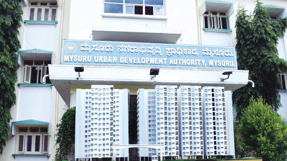 For whose benefit is MUDA’s Group Housing Project?
