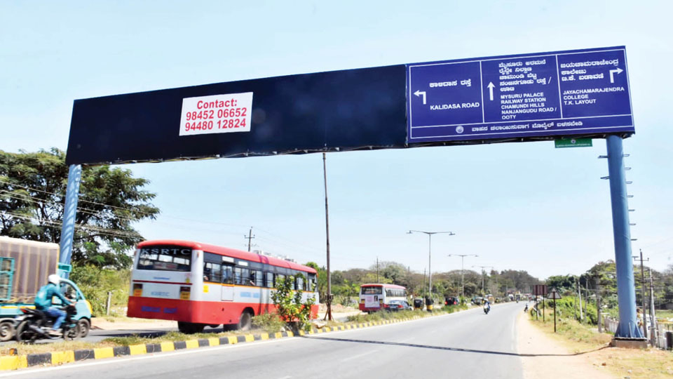 Signs of trouble: Misaligned signboards on Hunsur Road