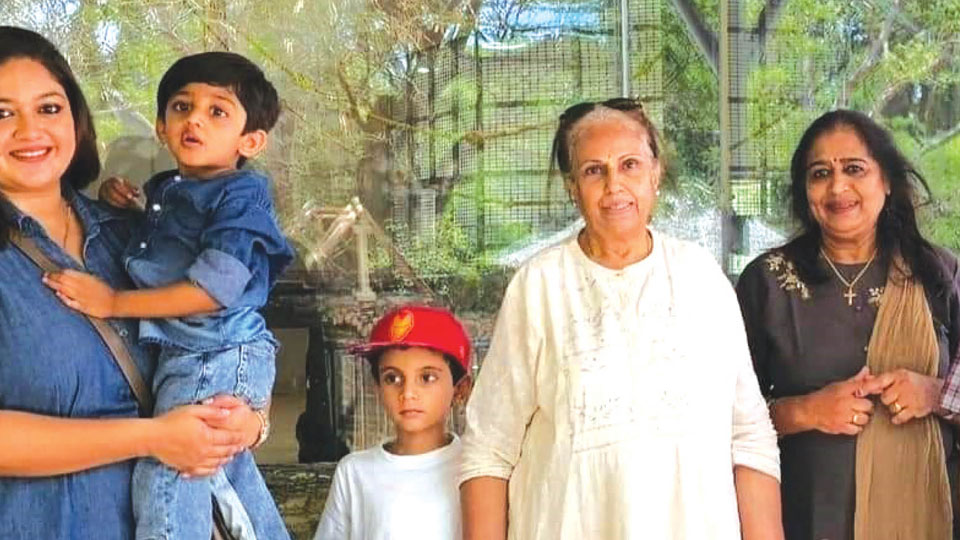 Son busy with polls, mom takes grand-kid to Zoo