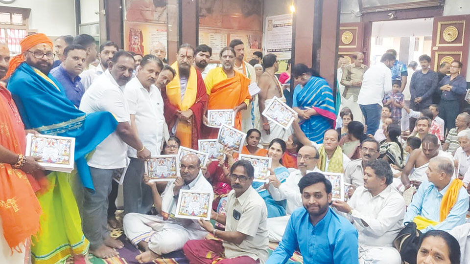 MLA Harishgowda distributes almanac to Brahmins