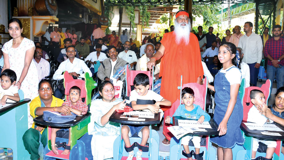 Sri Ganapathy Sachchidananda Swamiji’s 82nd birthday: Specially-abled given necessary equipment