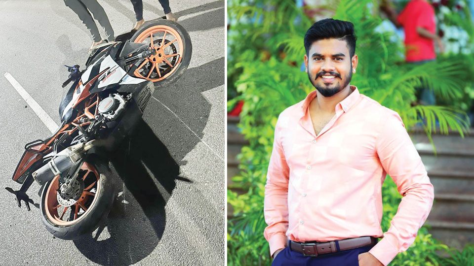Youth killed as bike hits road divider