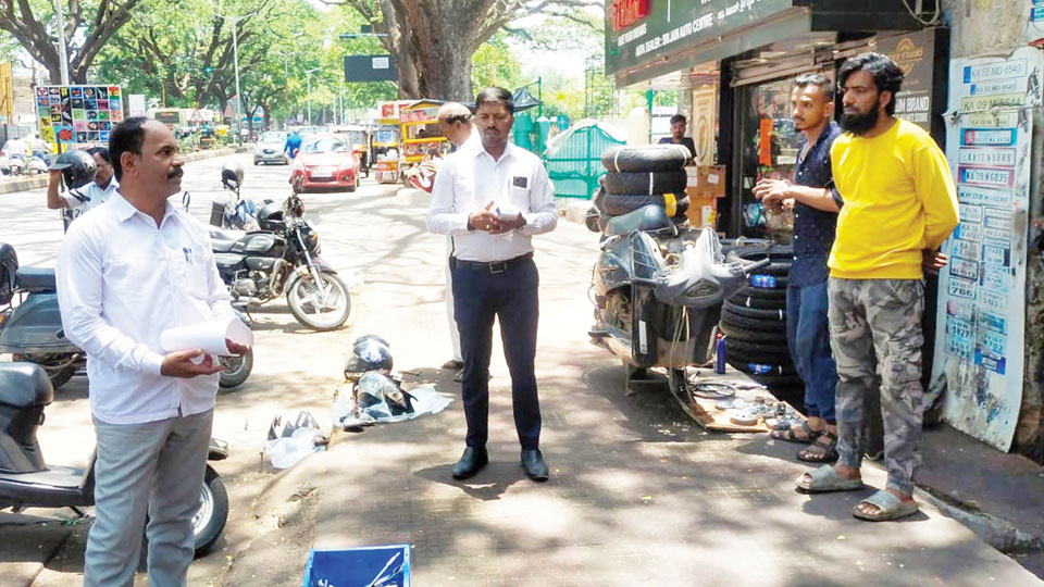 Officials clear encroachment on Chamaraja Double Road