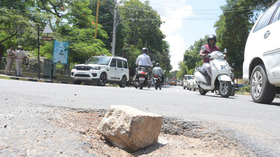 Huge stone posing danger at Javagal Srinath Circle