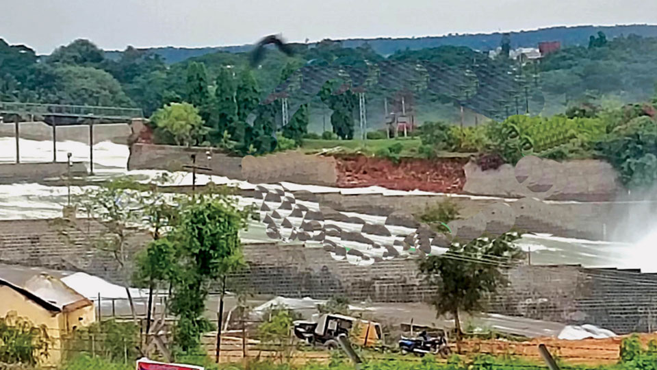 Release of water from KRS reservoir: Retaining wall of water discharge basin collapses