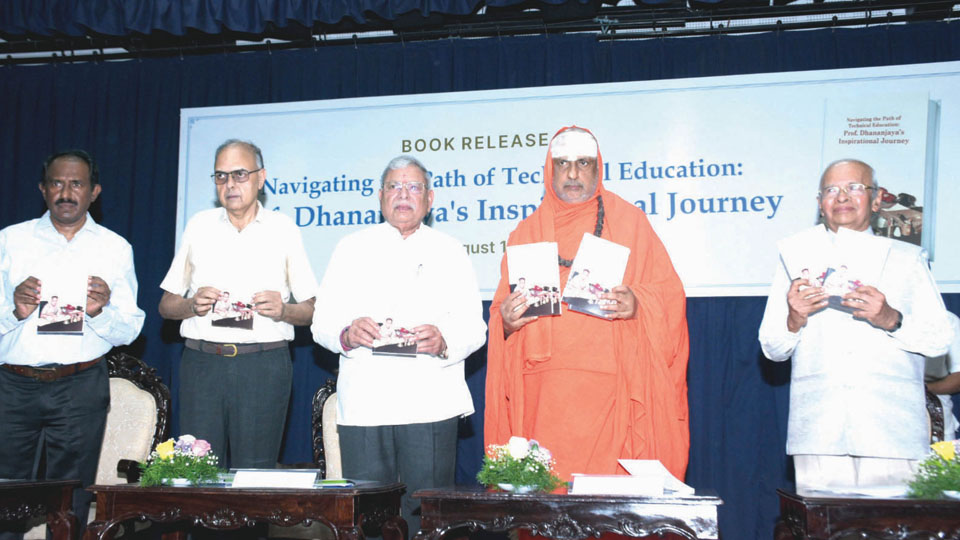 Suttur Mutt Seer releases book on Prof. M.H. Dhananjaya