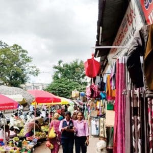 Devaraja Market footpath occupied with huge umbrellas