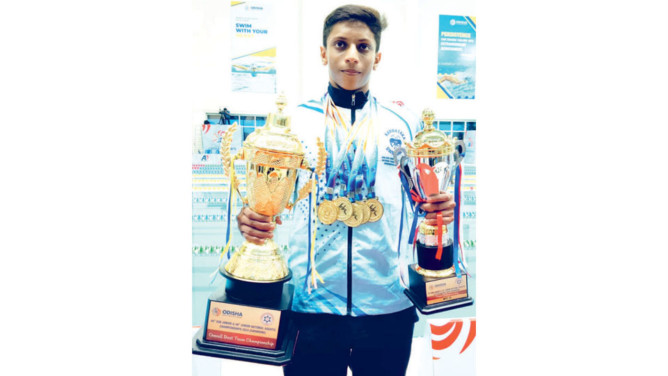 Wins four gold medals at National Aquatic Championship