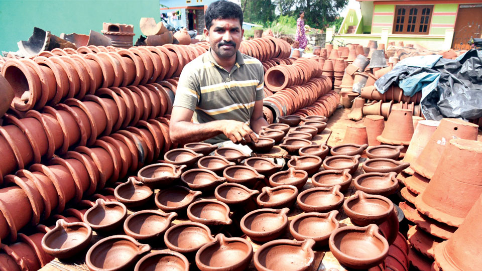 Clay lamps flicker amidst onslaught of modern lights