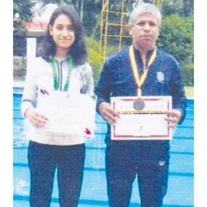 Father-daughter duo shine in swimming