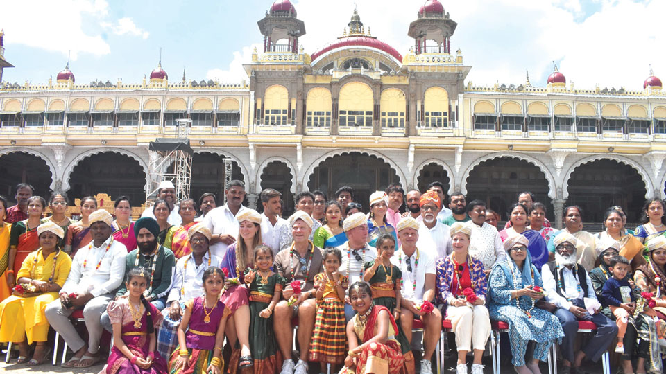 Tourists at Mysore Palace get a taste of tradition