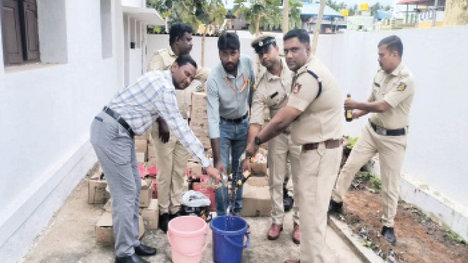 Seized liquor destroyed by Excise Department