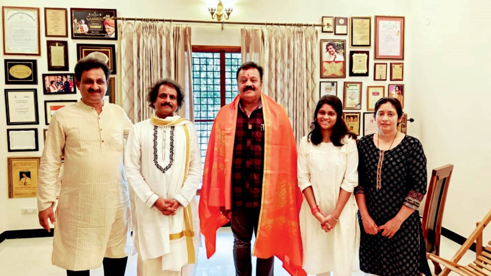 Union Minister Suresh Gopi visits residence of violin exponent Dr. Mysore Manjunath