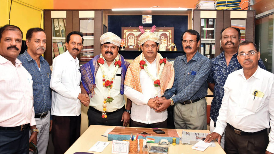 Elected unopposed to Mysuru Govt. Employees Housing Society